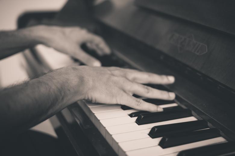 Free stock image of Pianist created by Unsplash