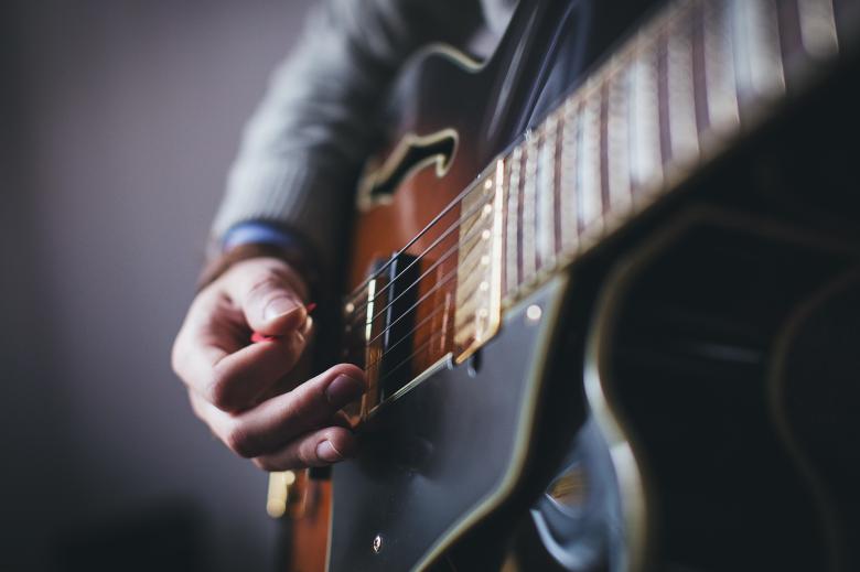 Free stock image of Guitarist created by Unsplash