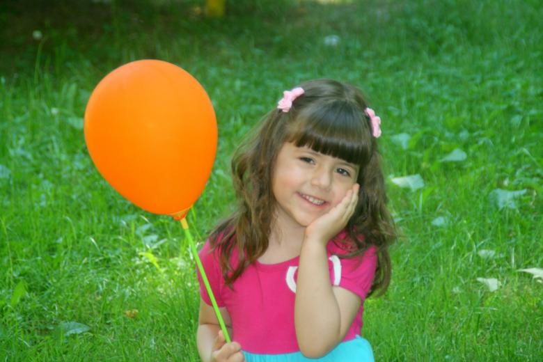 Free stock image of Girl holding a Balloon created by Pixabay
