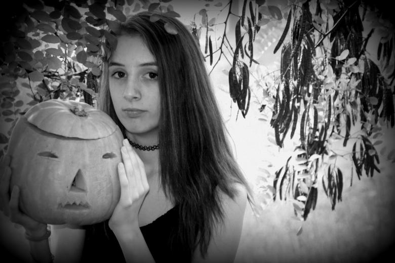 Free stock image of Girl holding a Pumpkin created by Pixabay