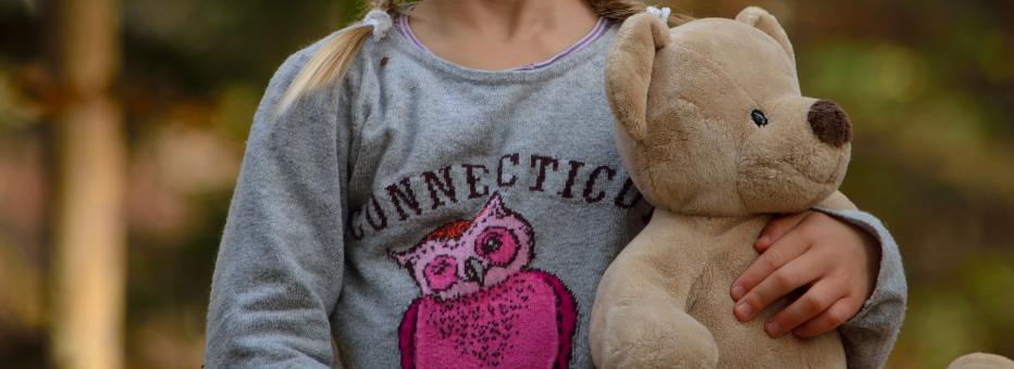 Free Stock Photo of Child with Stuffed Toy