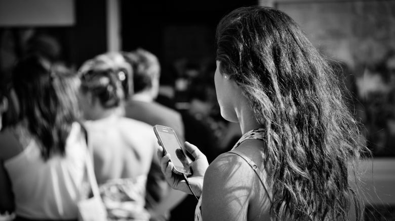 Free stock image of Girl using Smartphone created by Mark Timberlake