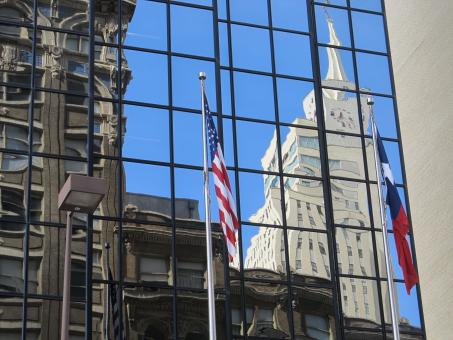 Free Stock Photo of American Flag in front of the Building