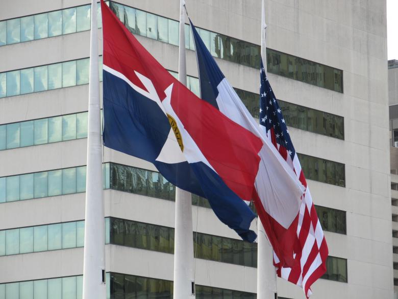 Free stock image of Flags in front of the Building created by Pixabay