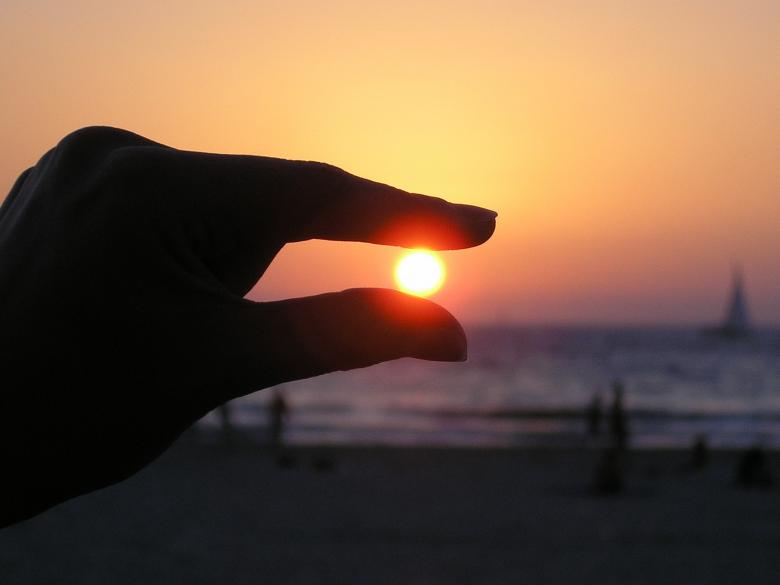Free stock image of Sun in the Hand created by Pixabay