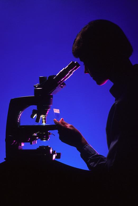 Free stock image of Scientist with Microscope created by Pixabay