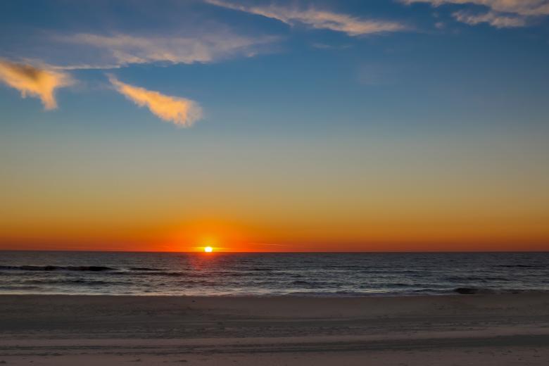 Free stock image of Sunset on the Seashore created by Pixabay