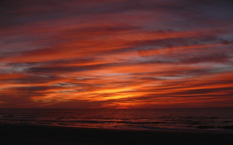 Free stock image of Sunrise on the Ocean created by Pixabay