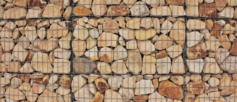 Free stock image of Fence with Stones Inside created by Pixabay