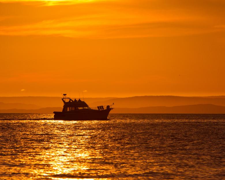 Free stock image of Boat at sunset created by Geoffrey Whiteway