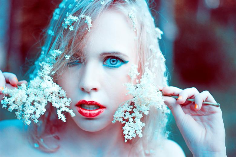 Free stock image of Girl with Flowers created by Pixabay