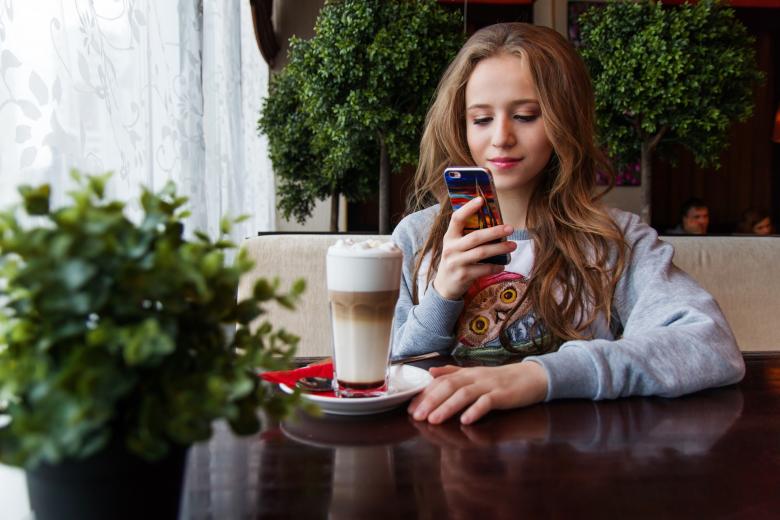 Free stock image of Girl using Cell created by Pixabay