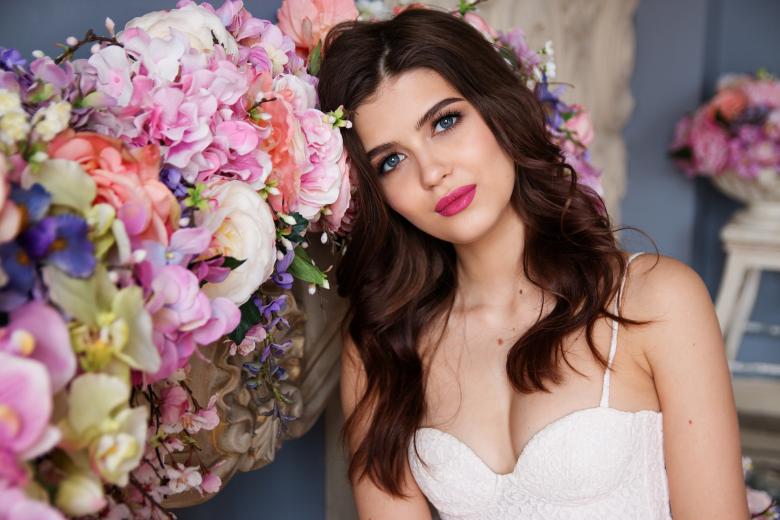 Free stock image of Girl with Flowers created by Pixabay