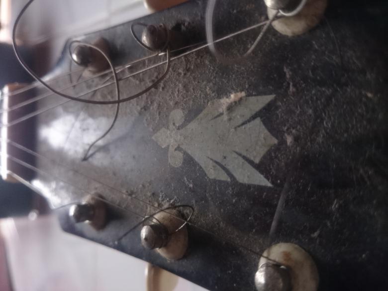 Free stock image of Dirty Old Guitar Headstock created by febri nura tarigan