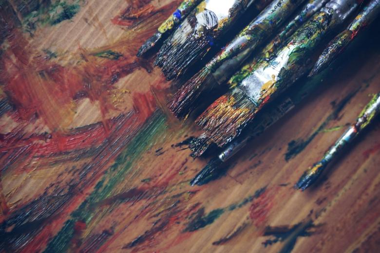 Free stock image of Smeared Paint and Brushes created by Pixabay
