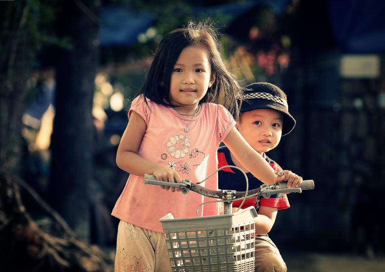 Free stock image of Siblings with a Bike created by Pixabay