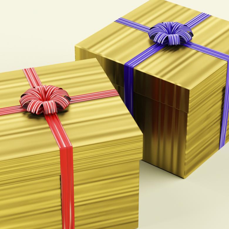 Free stock image of Gold Gift Boxes With Ribbon As Birthday Present created by Stuart Miles