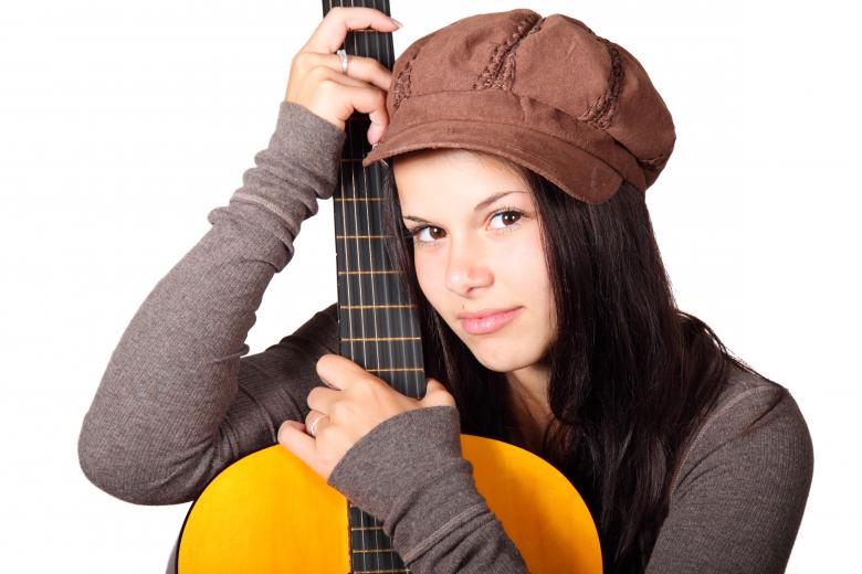 Free stock image of Girl with Guitar created by Pixabay