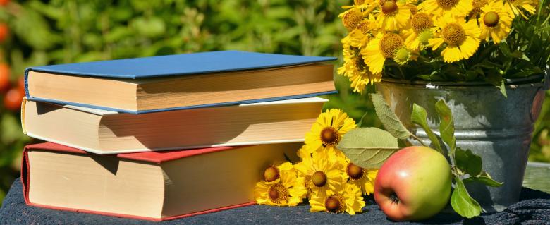 Free stock image of Books and Flowers created by Pixabay