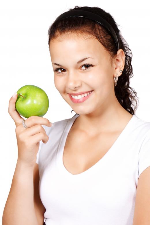 Free stock image of Girl with an Apple created by Pixabay