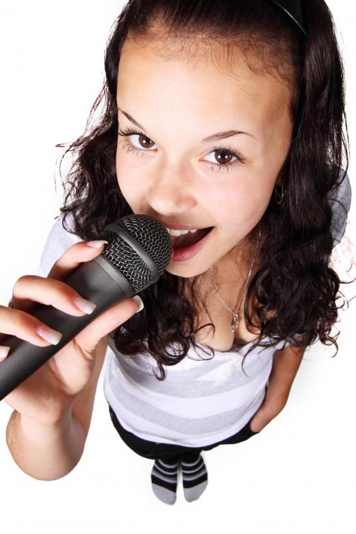 Free stock image of Girl with Mic created by Pixabay