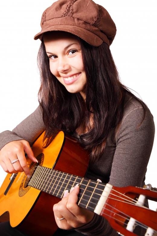 Free stock image of Girl with Guitar created by Pixabay