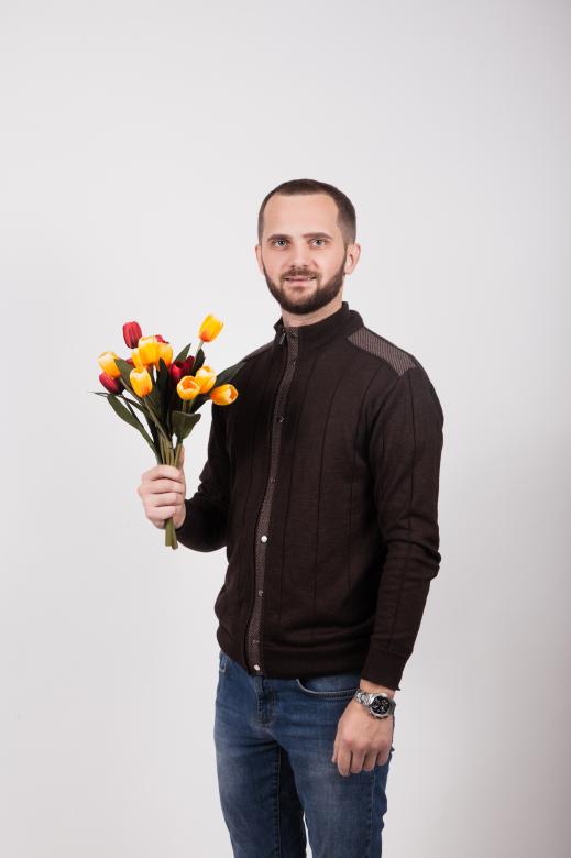 Free stock image of Man Holding Flowers created by Ilona Hrechkina