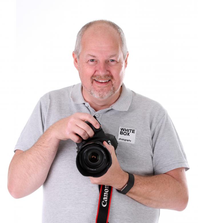 Free stock image of Older Man Holding a Camera created by Christopher Terrance Owen