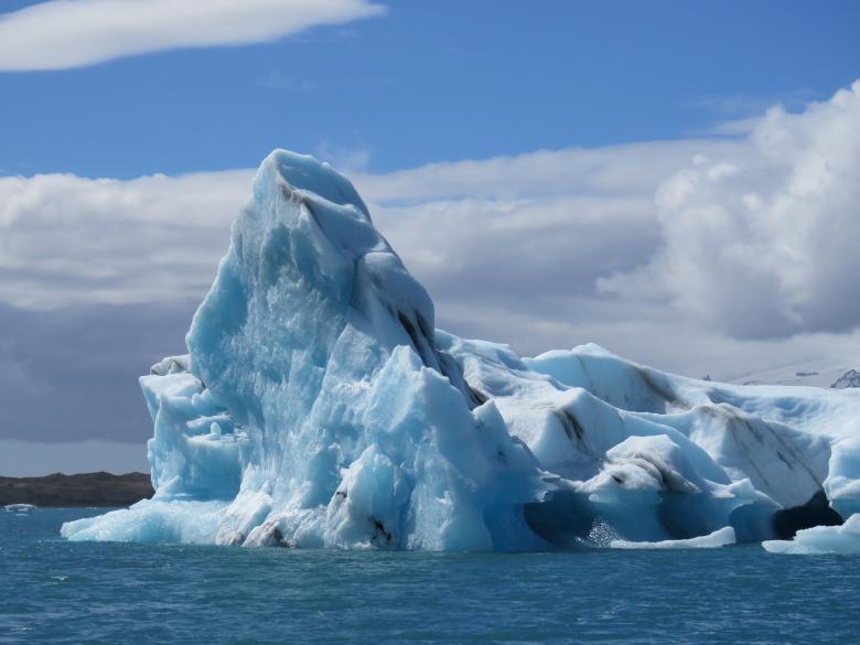 Free stock image of Large Iceberg Floating in the Ocean created by Castor Moss