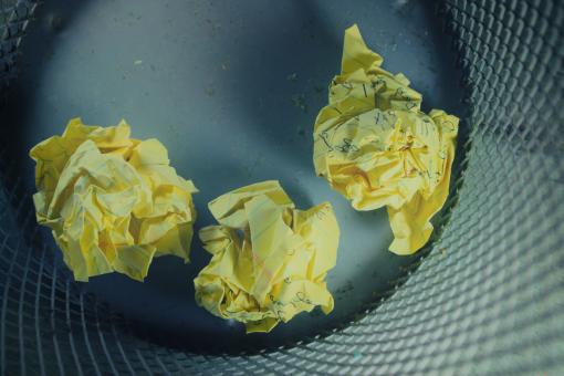 Crumbled Yellow Paper in Trash - Free Stock Photo