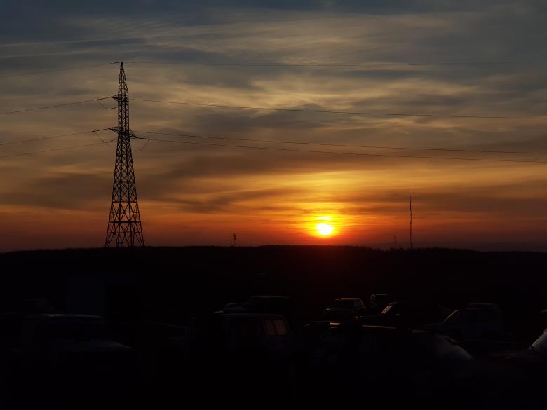 Free stock image of Sunset over the hills created by Radu Dalas