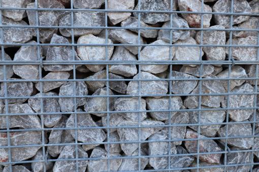 Free Stock Photo of Stones in a steel prison...