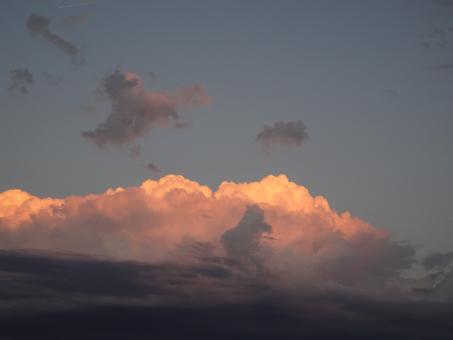 Huge white cloud hiding the sunrise - Free Stock Photo