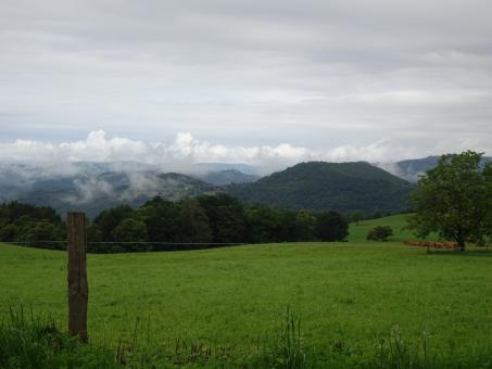Free Stock Photo of Foggy and cloudy day over the hills