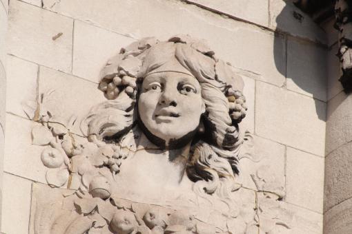 Free Stock Photo of Stone sculpture of face on a wall
