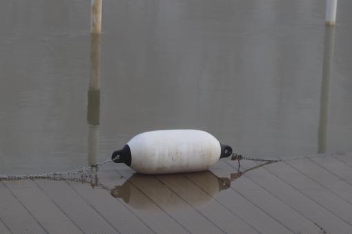 Free Stock Photo of Lonely buoy on the riverside