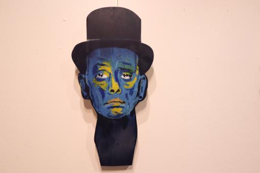 Graffiti portrait of man with hat in an art gallery - Free Stock Photo