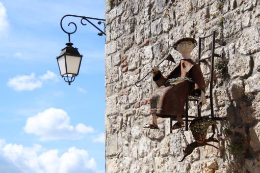 Free Stock Photo of Old craftsman's sign in a small village