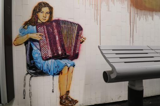 Graffiti of woman playing accordion - Free Stock Photo