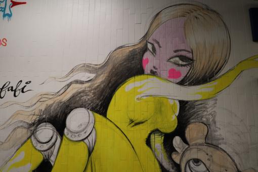 Free Stock Photo of Graffiti of young girl with yellow clothes