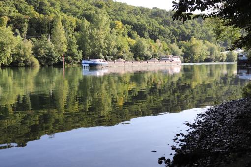 Free Stock Photo of Barge on a quiet river