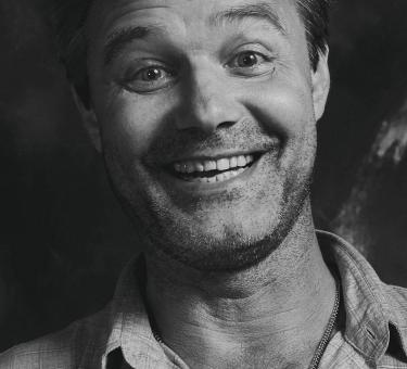 Black and White Portrait of Happy Man - Free Stock Photo