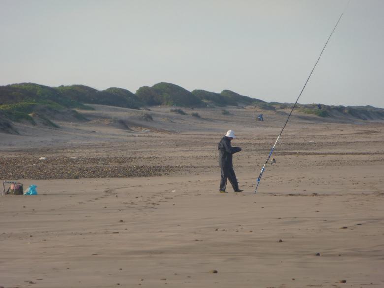 Free stock image of Man fishing on the beach created by MOSTAFA SAHNONI
