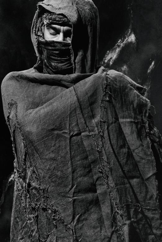 Free stock image of Man in Cloak - Black and White created by Alexander Krivitskiy
