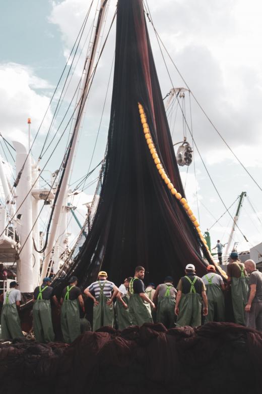 Free stock image of Sailors Working on Netting created by Sahin Sezer Dincer