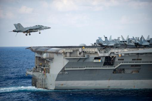 Fighter Jet Landing on Aircraft Carrier - Free Stock Photo