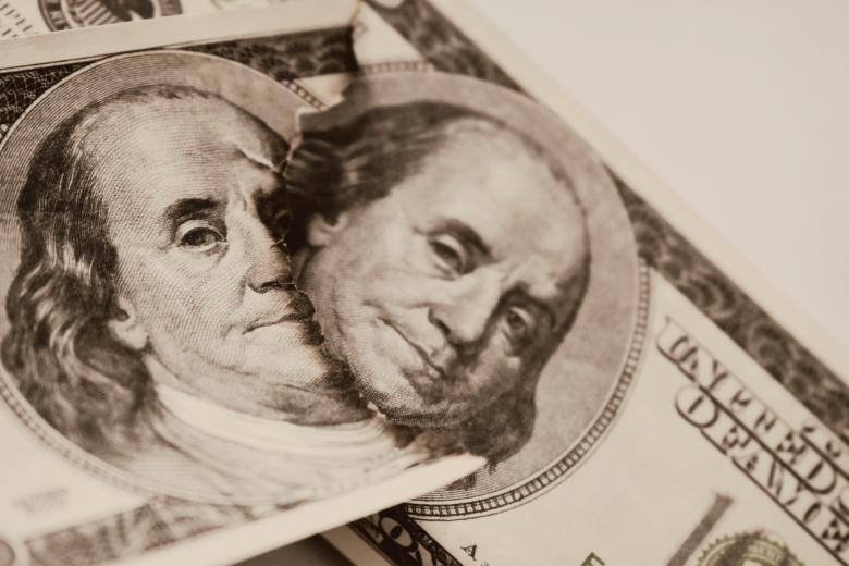 Free stock image of Ben Franklin's face on two USD bank notes created by NomeVizualizzato