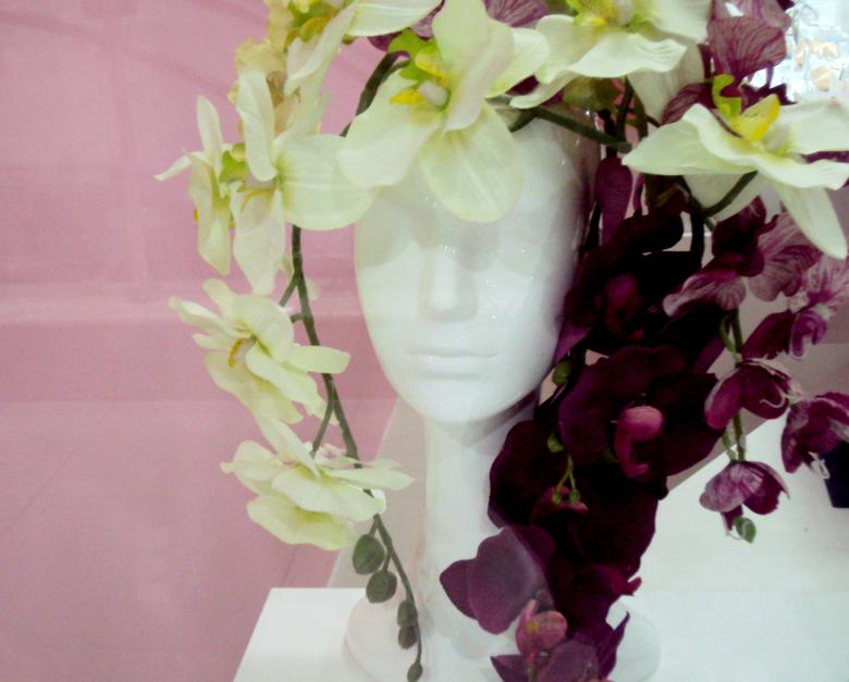 Free stock image of Woman with orchids created by NomeVizualizzato