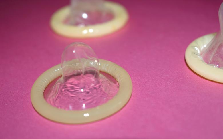 Free stock image of Three condoms on pink background created by NomeVizualizzato