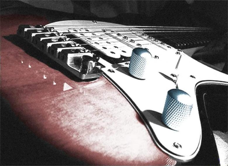 Free stock image of Red Guitar Close Up created by Andrea Guarino